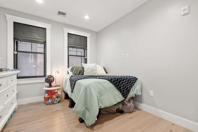 331 Chelsea St Unit 1, Boston, MA 02128 - bedroom featuring wood finished floors, baseboards, and recessed lighting