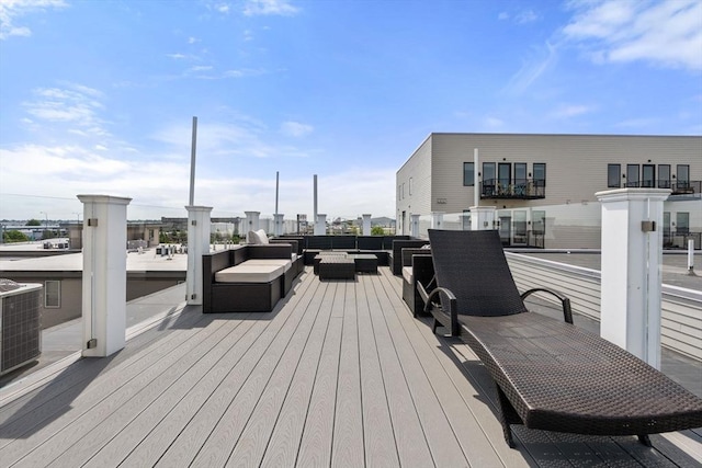 331 Chelsea St Unit 1, Boston, MA 02128 - wooden terrace featuring an outdoor living space and central AC
