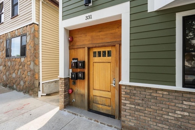 331 Chelsea St Unit 1, Boston, MA 02128 - property entrance with stone siding