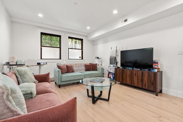 331 Chelsea St Unit 1, Boston, MA 02128 - living room with light wood-style floors, recessed lighting, and baseboards