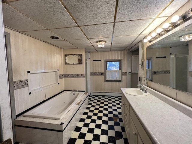 full bath with wooden walls, tile patterned floors, a jetted tub, vanity, and a shower stall