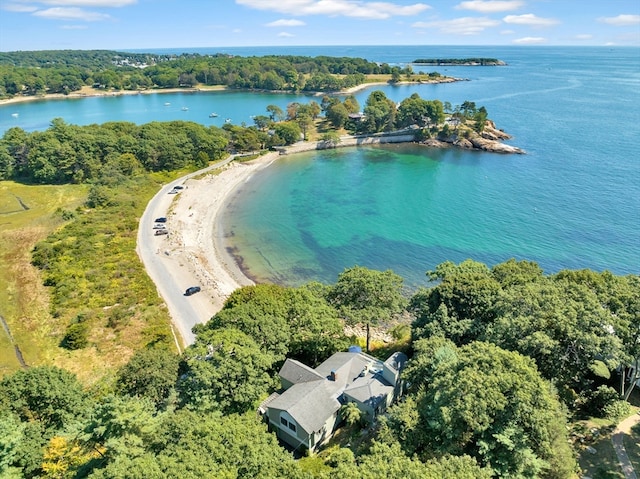 bird's eye view with a water view and a beach view