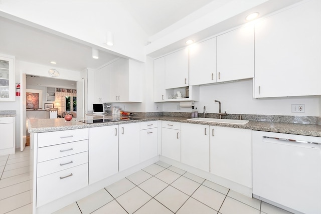 kitchen featuring white cabinets, dishwasher, and sink