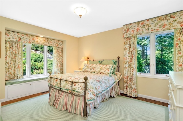 bedroom with light hardwood / wood-style floors