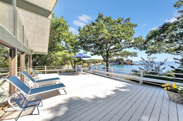 deck featuring a water view