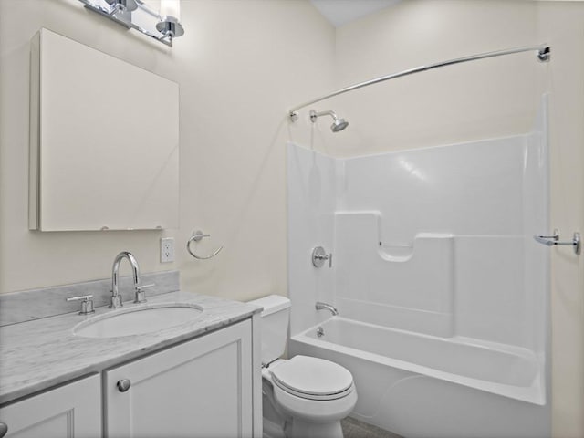 full bath featuring toilet, vanity, and shower / bath combination
