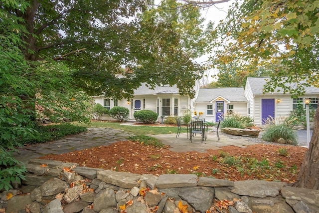 view of front of house with a patio