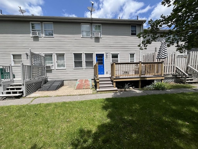 35 Wall Unit B, Worcester, MA 01604 - back of house featuring a deck, a lawn, and cooling unit
