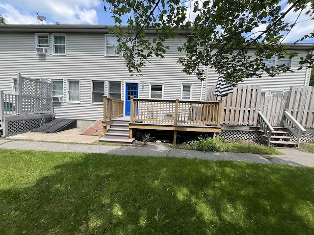35 Wall Unit B, Worcester, MA 01604 - back of property featuring a deck, a yard, and cooling unit