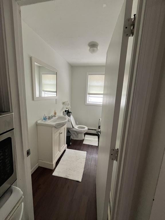 35 Wall Unit B, Worcester, MA 01604 - bathroom featuring toilet, wood finished floors, and vanity