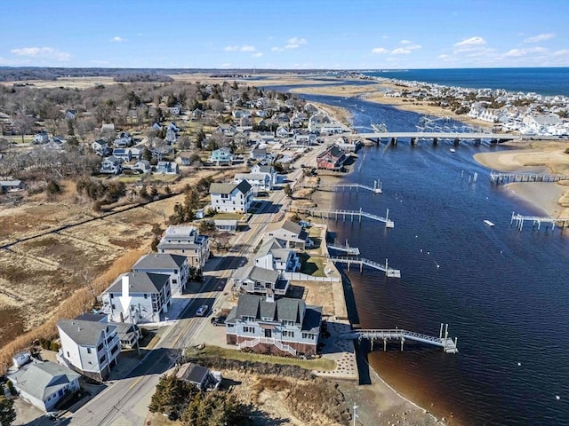 aerial view with a residential view and a water view