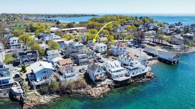 bird's eye view featuring a residential view and a water view