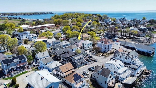 aerial view featuring a residential view and a water view