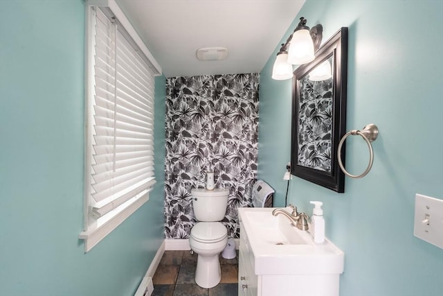 263 Jefferson Ave, Salem, MA 01970 - bathroom with an accent wall, vanity, and wallpapered walls