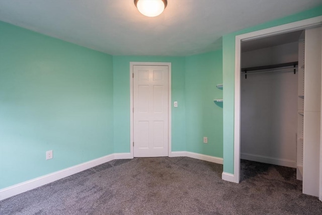 263 Jefferson Ave, Salem, MA 01970 - unfurnished bedroom with dark carpet and a closet
