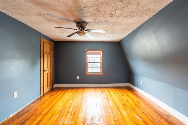 263 Jefferson Ave, Salem, MA 01970 - spare room featuring light wood-style flooring, ceiling fan, and a textured ceiling