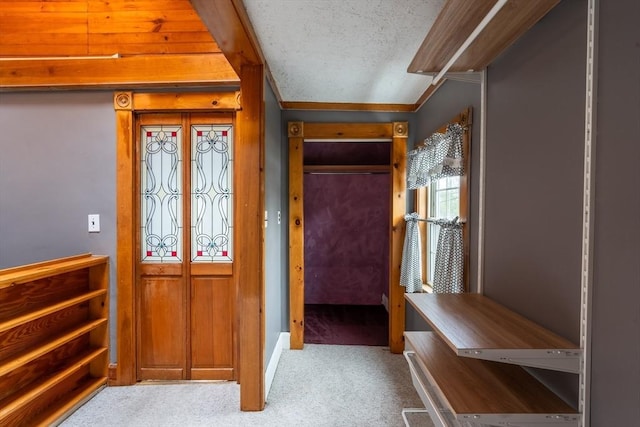 263 Jefferson Ave, Salem, MA 01970 - carpeted foyer featuring a textured ceiling