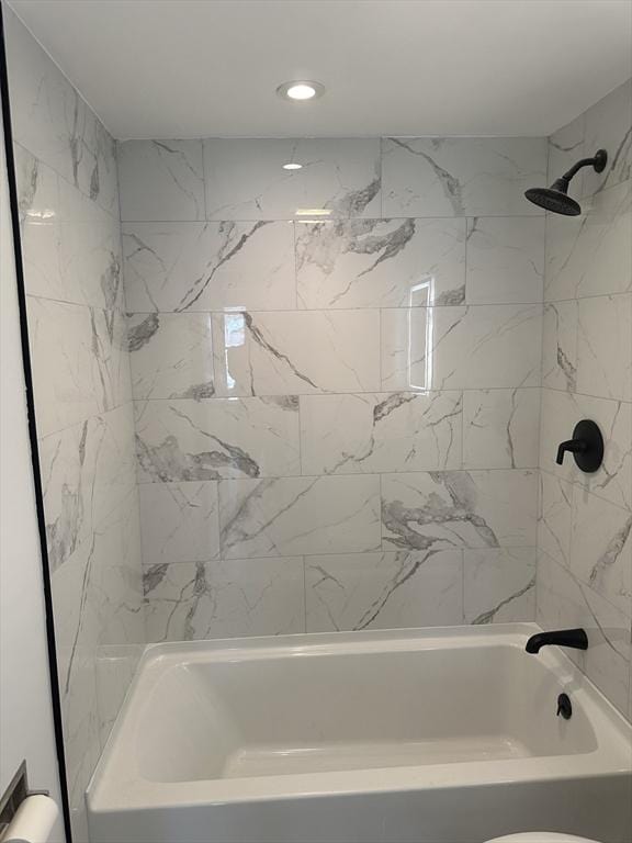 full bath featuring shower / bathing tub combination and toilet