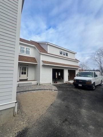 view of front of property featuring a garage