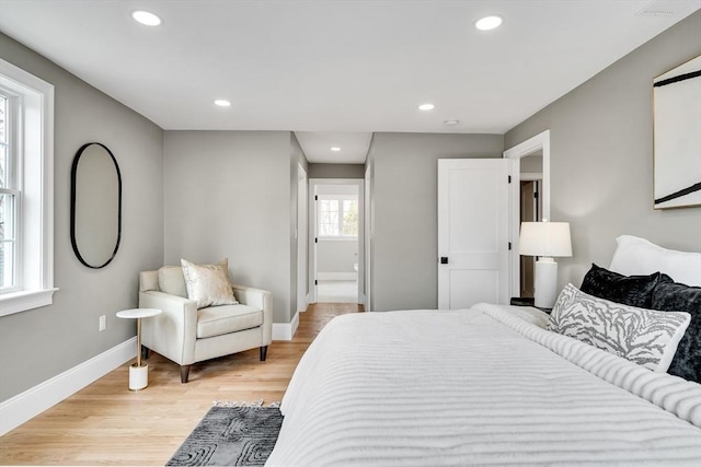 bedroom featuring light wood-style floors, baseboards, and recessed lighting