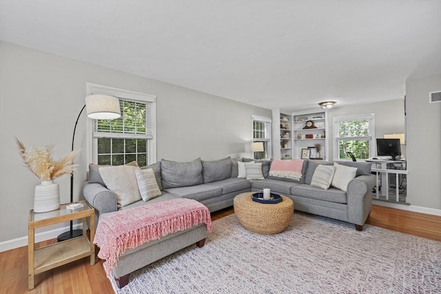 82 Knollwood Dr, Longmeadow, MA 01106 - living area with wood finished floors and built in shelves