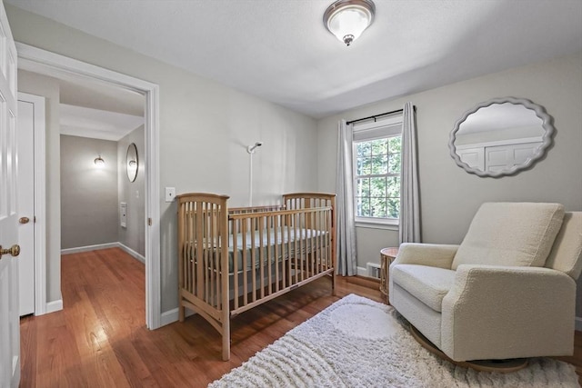 82 Knollwood Dr, Longmeadow, MA 01106 - bedroom featuring wood finished floors and baseboards