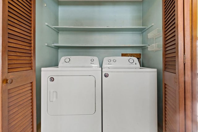 laundry area featuring washing machine and dryer