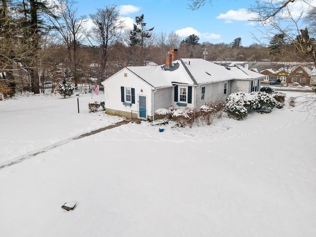 view of snow covered property