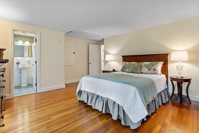 1 Emerson Dr, Acton, MA 01720 - bedroom with light wood-style flooring, baseboards, and attic access