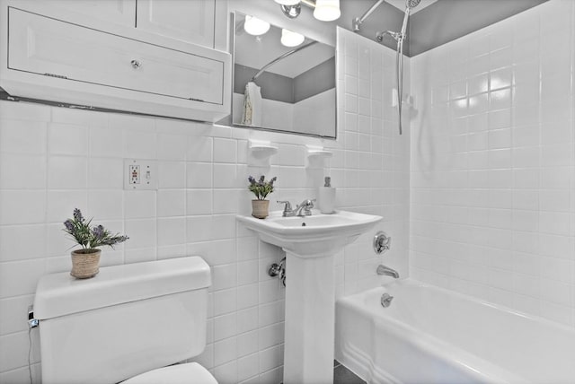 1 Emerson Dr, Acton, MA 01720 - full bathroom featuring toilet, shower / washtub combination, tile walls, and a sink