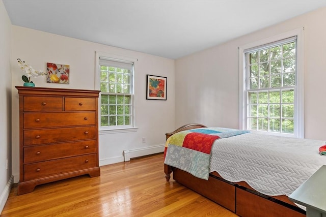 1 Emerson Dr, Acton, MA 01720 - bedroom with light wood-type flooring, baseboard heating, and baseboards