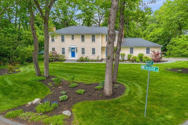 1 Emerson Dr, Acton, MA 01720 - colonial inspired home featuring a front yard and a chimney