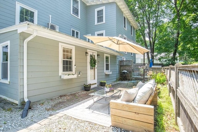 1 Nelson St Unit C, Upton, MA 01568 - back of house with a patio area and an outdoor hangout area