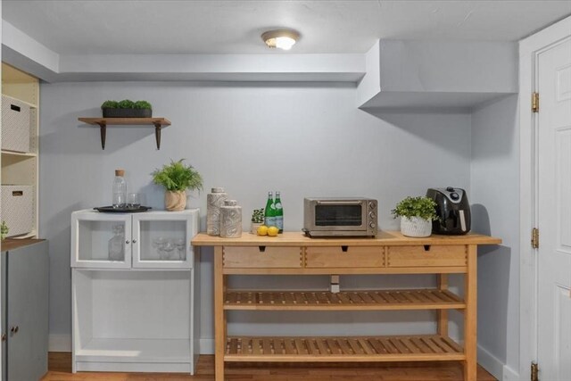1 Nelson St Unit C, Upton, MA 01568 - bar area featuring baseboards and wood finished floors