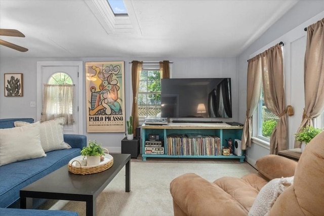 1 Nelson St Unit C, Upton, MA 01568 - carpeted living area featuring a ceiling fan and a skylight