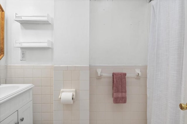 1 Nelson St Unit C, Upton, MA 01568 - full bathroom with vanity, a wainscoted wall, tile walls, and a shower with curtain
