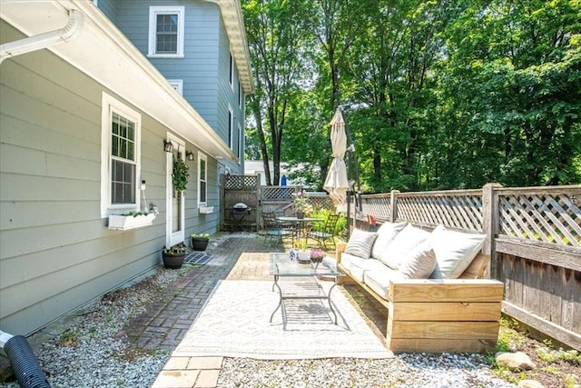 1 Nelson St Unit C, Upton, MA 01568 - fenced backyard featuring an outdoor hangout area, a patio area, and outdoor dining area