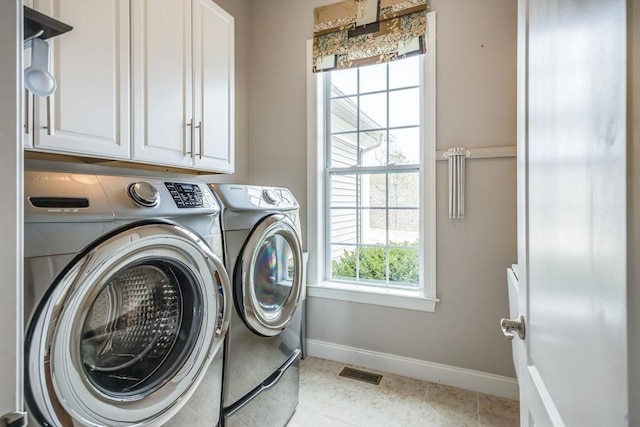12 Skipping Stone, Plymouth, MA 02360 - clothes washing area featuring baseboards, washing machine and dryer, and cabinet space