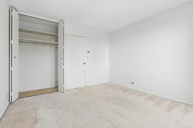 unfurnished bedroom with carpet flooring