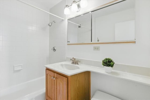 bathroom with vanity and shower / bathtub combination