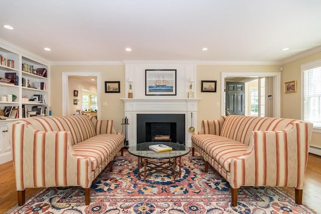 617 S St, Needham, MA 02492 - living room with ornamental molding, light wood-style flooring, a fireplace, and recessed lighting