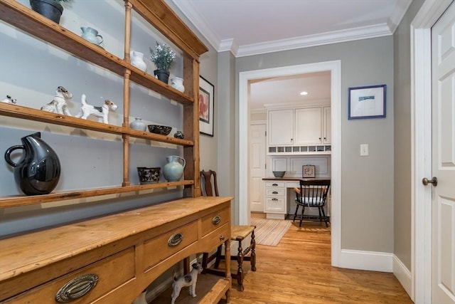 617 S St, Needham, MA 02492 - hall featuring an office area, light wood-style floors, ornamental molding, and baseboards