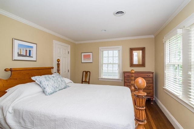617 S St, Needham, MA 02492 - bedroom featuring crown molding, wood finished floors, and baseboards