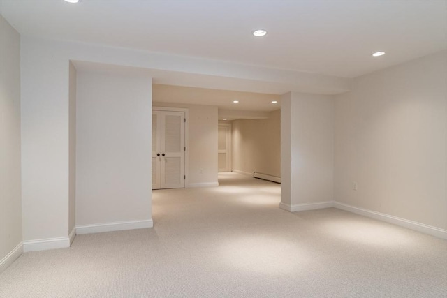 617 S St, Needham, MA 02492 - unfurnished room with a baseboard heating unit, recessed lighting, light colored carpet, and baseboards