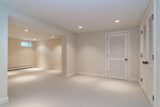 617 S St, Needham, MA 02492 - below grade area featuring light carpet, recessed lighting, a baseboard radiator, and baseboards