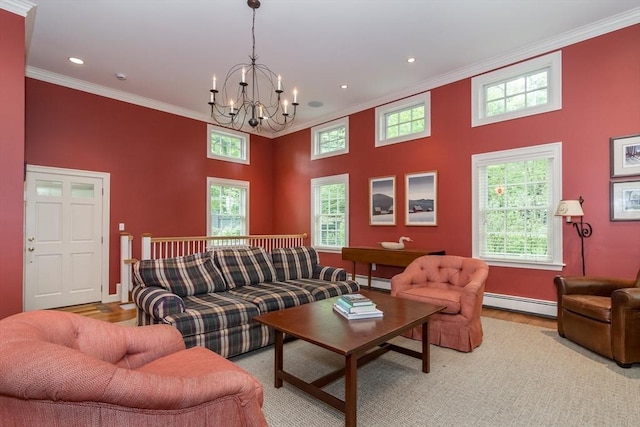 617 S St, Needham, MA 02492 - living room featuring crown molding, baseboard heating, a chandelier, healthy amount of natural light, and a high ceiling