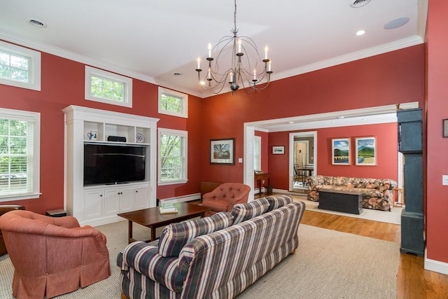617 S St, Needham, MA 02492 - living area featuring a baseboard radiator, ornamental molding, a chandelier, wood finished floors, and recessed lighting