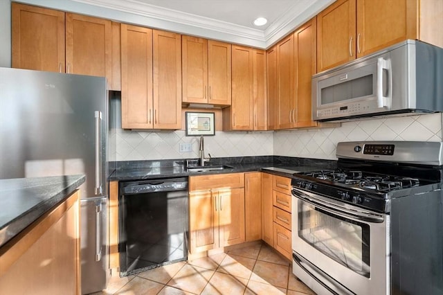 59 Babcock St Unit 5, Brookline, MA 02446 - kitchen featuring stainless steel appliances, crown molding, a sink, tasteful backsplash, and light tile patterned floors