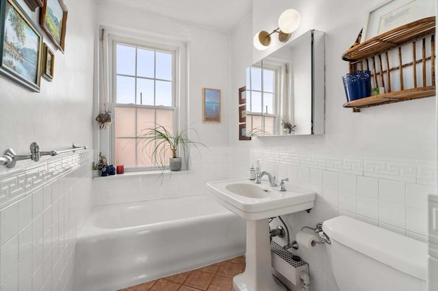 59 Babcock St Unit 5, Brookline, MA 02446 - full bath featuring tile walls, toilet, a bathtub, and tile patterned floors