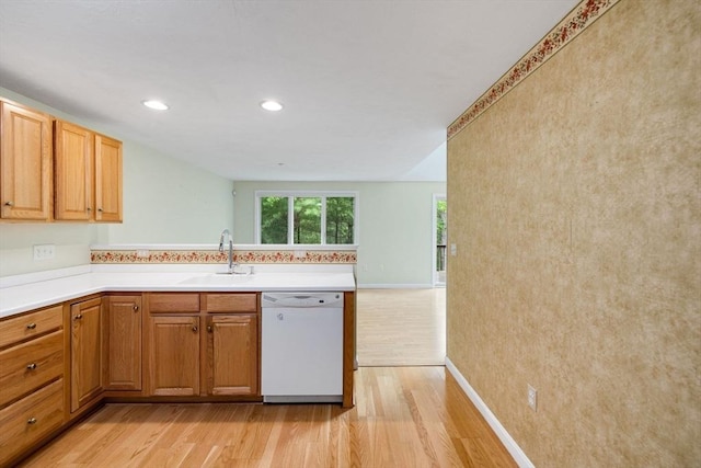 15 Pebble Bch Unit 2005-103, Mashpee, MA 02649 - kitchen with white dishwasher, light wood-type flooring, a peninsula, light countertops, and recessed lighting